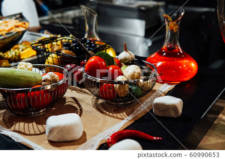 different vegetables in the kitchen of the restaurant nutrition vitamins 60990653