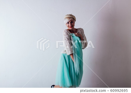 Portrait of beautiful woman blond with short hair Portrait of beautiful woman blond with short hair 60992695