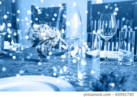 Holiday party blurred background made from decorated table Holiday party blurred background made from decorated table 60992780