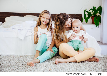 three girls sisters in the play in the bedroom in the morning love three girls sisters in the play in the bedroom in the morning love 60993948