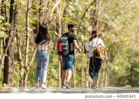 Group  traveler happy with backpack adventure  60995943
