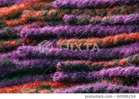 Texture pattern of red, purple and cocoon yarn Texture pattern of red, purple and cocoon yarn 60996284