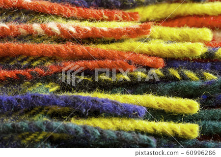 Texture pattern of red, yellow, navy blue and green yarn 60996286