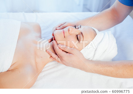 doctor cosmetologist doing facial massage girl spa doctor cosmetologist doing facial massage girl spa 60996775