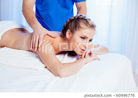 the doctor makes a back massage and body girl spa treatments the doctor makes a back massage and body girl spa treatments 60996776