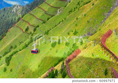 Cable car from Wengen to Mannlichen, Switzerland Cable car from Wengen to Mannlichen, Switzerland 60997971