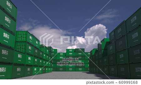 Cargo containers with MADE IN SAUDI ARABIA text and national flags. Import or export related 3D rendering 60999168