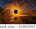 2020 written on the air with flying burning sparks 61002903