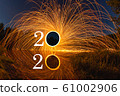 2020 written on the air with flying burning sparks 61002906