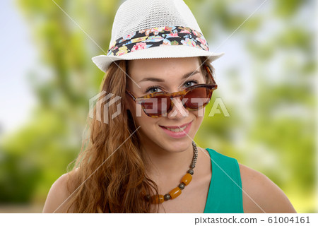 Beautiful portrait of fashion model, with hat Beautiful portrait of fashion model, with hat 61004161