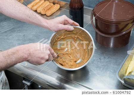 pastry cook prepares the dough pastry cook prepares the dough 61004792