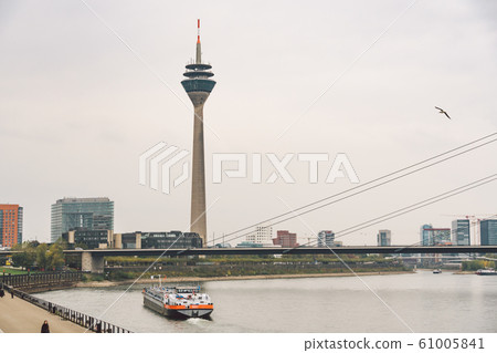 25 October 2018 Germany, Dusseldorf. TV tower, sightseeing in the city center in the fall in cloudy weather. Rhine Tower Rheinturm in Dusseldorf. It is the tallest building 61005841