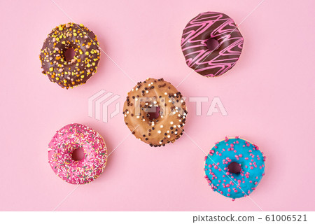 Different types of a colorful donats decorated 61006521