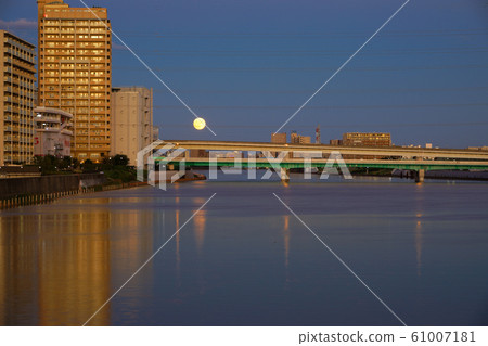 View of Okubashi from Kodaibashi at dusk with the typhoon passing Sumida River and full moon View of Okubashi from Kodaibashi at dusk with the typhoon passing Sumida River and full moon 61007181