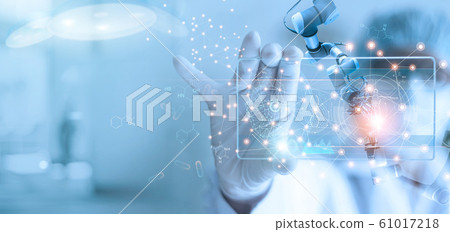 Doctor and medical assistant robot analysis and testing result of DNA on modern virtual interface, science and technology, innovative and future of medical healthcare in laboratory background. Doctor and medical assistant robot analysis and testing result of DNA on modern virtual interface, science and technology, innovative and future of medical healthcare in laboratory background. 61017218