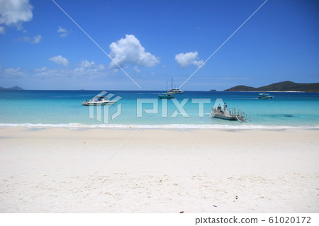 Beach and blue sea Beach and blue sea 61020172