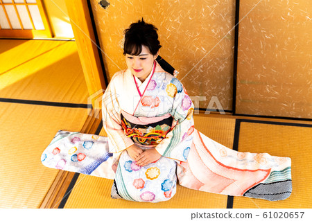 A woman in a kimono 61020657