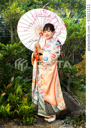 A woman in a kimono 61021211