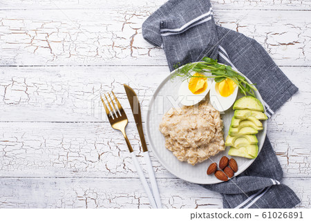 Healthy balanced breakfast in plate 61026891