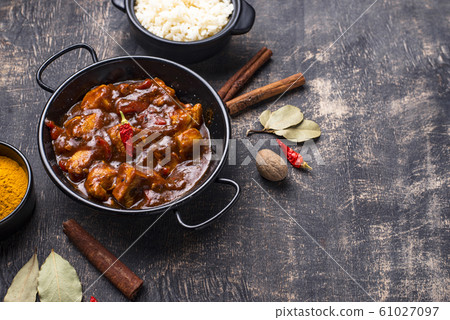 Curry chicken tikka masala with rice Curry chicken tikka masala with rice 61027097