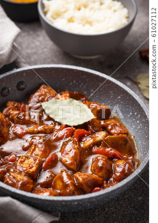 Curry chicken tikka masala with rice Curry chicken tikka masala with rice 61027112