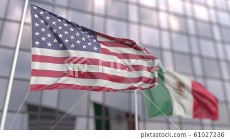 Waving flags of the USA and Mexico in front of a modern skyscraper facade. 3D rendering Waving flags of the USA and Mexico in front of a modern skyscraper facade. 3D rendering 61027286