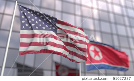 Waving flags of the USA and North Korea in front of a modern skyscraper facade. 3D rendering Waving flags of the USA and North Korea in front of a modern skyscraper facade. 3D rendering 61027287