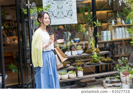 Young woman with shopping Young woman with shopping 61027728