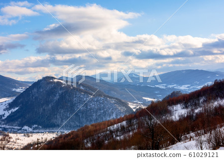 mountainous rural landscape on a sunny winter day mountainous rural landscape on a sunny winter day 61029121