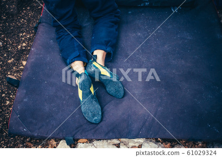 Leg in climbing shoe photo. Leg in climbing shoe photo. 61029324