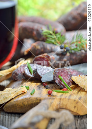 South Tyrolean snack with red wine 61029539