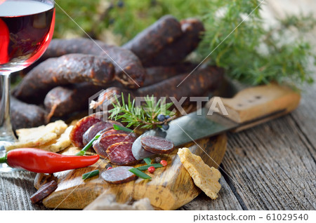 South Tyrolean snack with red wine South Tyrolean snack with red wine 61029540