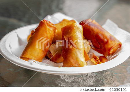spring rolls fried fast food asia street snack. 61030191