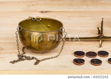 hanging scales old of bronze with a chain and hanging scales old of bronze with a chain and 61031242