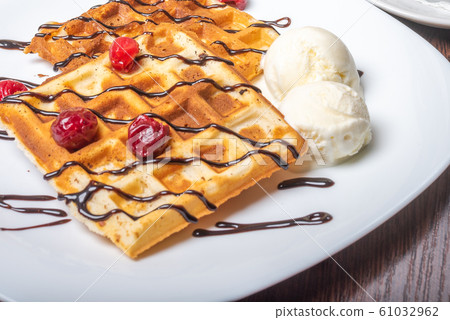 Viennese waffles with ice cream, chocolate and Viennese waffles with ice cream, chocolate and 61032962