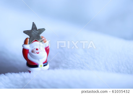 Christmas image, Santa Claus with stars in the snow 61035432