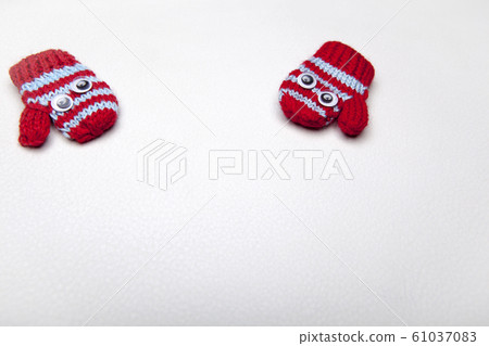 wool gloves white leather background  61037083