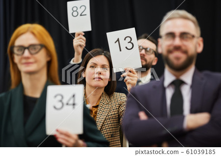 People voting at conference 61039185