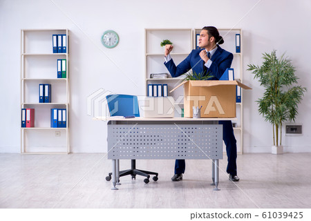 Young employee being made redundant 61039425