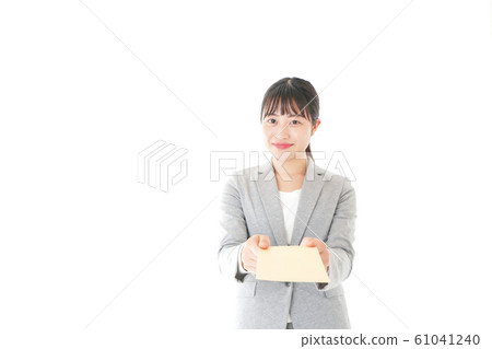Young business woman submitting documents 61041240