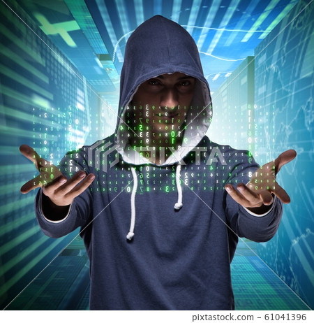 Young hacker in cyber security concept Young hacker in cyber security concept 61041396