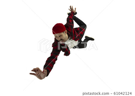 A second before falling - young man falling down with bright emotions and expression A second before falling - young man falling down with bright emotions and expression 61042124
