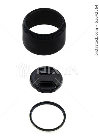 lens hood, lens cap and lens on an isolated 61042564