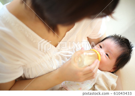 Baby drinking milk Baby drinking milk 61043433