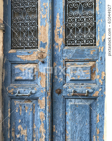 closed old wooden door as a background closed old wooden door as a background 61044927