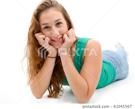 smiling woman in green casual smart clothing, 61045567