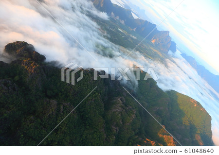 Landscape with sea of clouds in Vang Vieng, Laos Landscape with sea of clouds in Vang Vieng, Laos 61048640