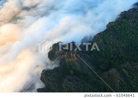 Landscape with sea of clouds in Vang Vieng, Laos Landscape with sea of clouds in Vang Vieng, Laos 61048641