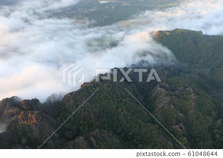 Landscape with sea of clouds in Vang Vieng, Laos Landscape with sea of clouds in Vang Vieng, Laos 61048644