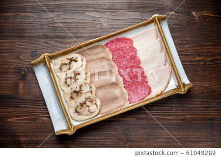 Assorted meat sliced. Restaurant menu Assorted meat sliced. Restaurant menu 61049289